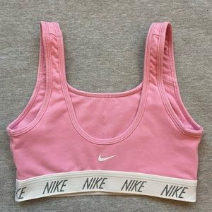Pastel pink Nike Dri-Fit sports bra